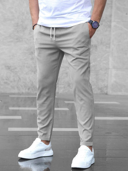 Pantalon tendance pour homme – coupe slim, poches et cordon